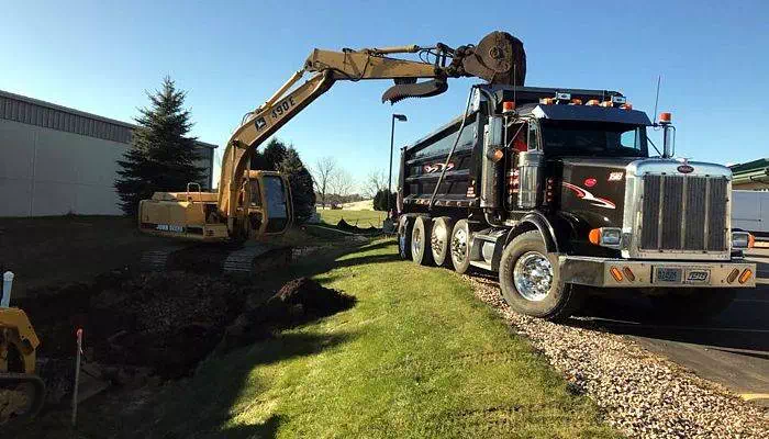 Black truck being loaded