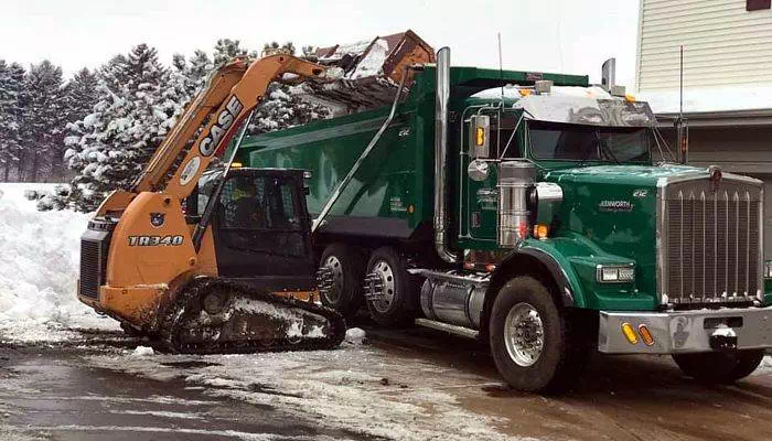 Green Truck being loaded